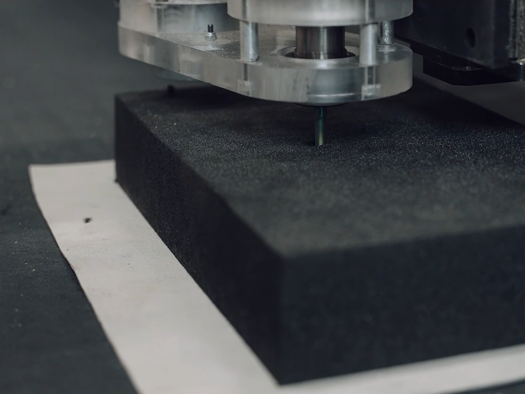 Vacuum table holding foam piece